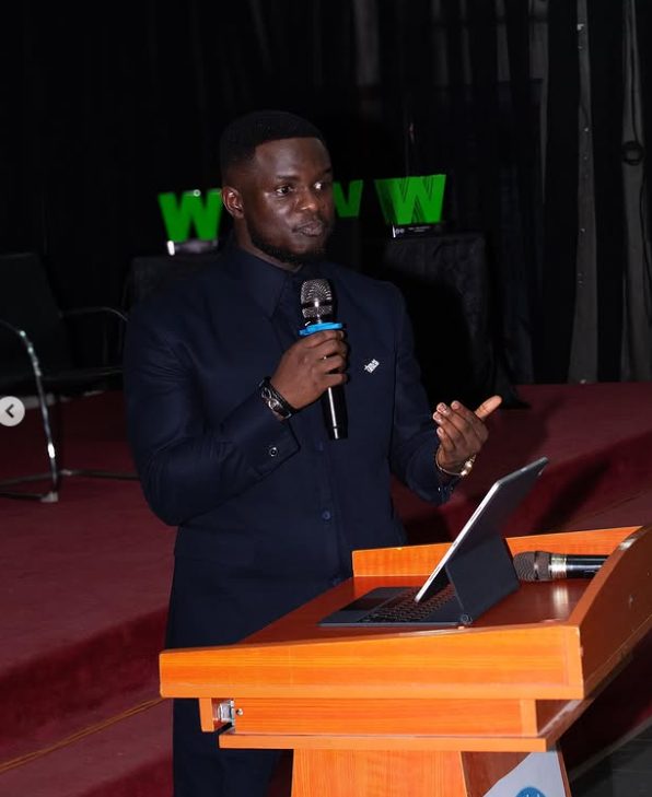Speaking at a podium