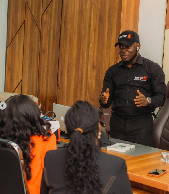 Oluwole mentoring a session at the Seven30 office